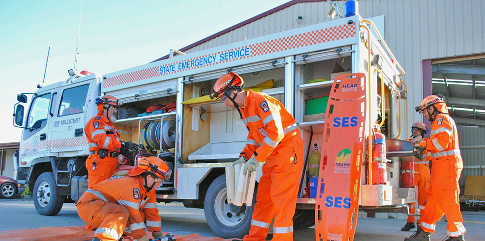 SA State Emergency Service volunteers packing equipment into an SES rescue vehicle